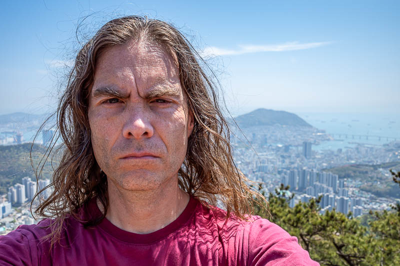 Korea-Busan-Hiking-Seunghaksan - YES! Here I am. Great selfie today. My blood red shirt really helps accentuate my best features.