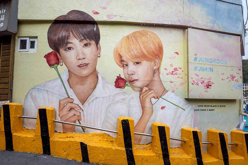 More of the same of Korea - March and April 2024 - Tribute murals of girly men such as these two are also prominent features all around Gamcheon. There was a line, but I snapped my shot during a change