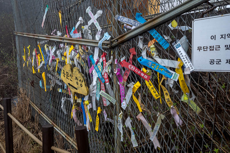 More of the same of Korea - March and April 2024 - The summit was completely fogged off. Here are some ribbons from the local hiking clubs.