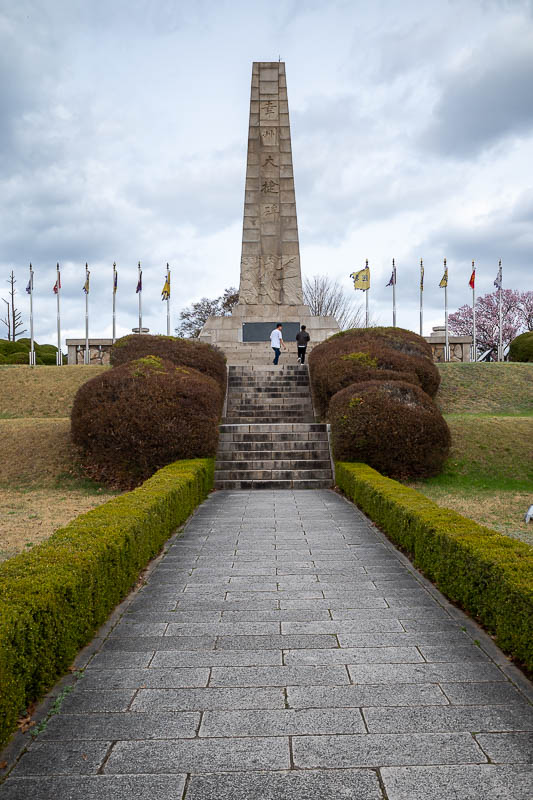 Korea-Seoul-Museum-Fortress - A monument commemorating a battle that occurred at the fortress. I suspect where this is was once a fortress. There were signs showing bits of gravel 