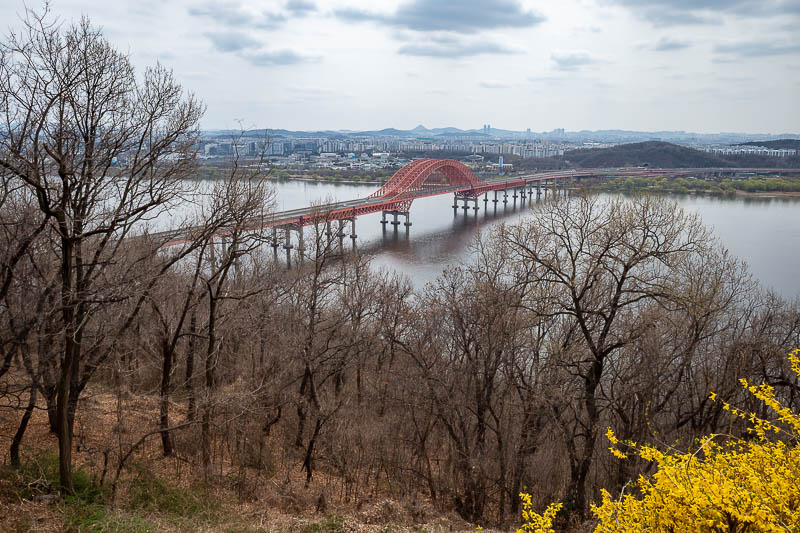 Korea-Seoul-Museum-Fortress - Final pic from the no fortress mountain. A red bridge. Getting back to the city proper went on the new GTX line, after a bus, one station on the norma