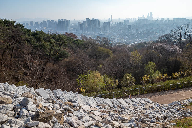 Korea-Seoul-Namsan-Itaewon - Here is the old wall, or possibly building rubble. Check out the pollution.