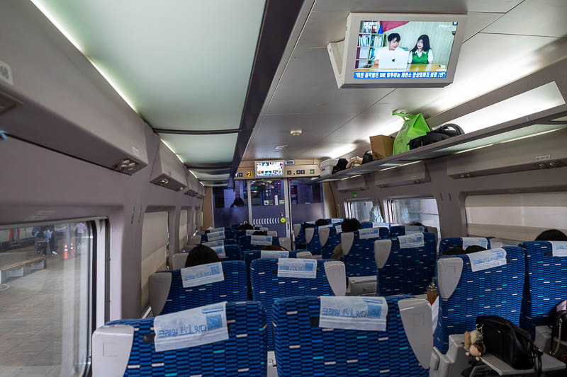 Korea-Seoul-Changwon-Train - The inside is a 2x2 layout. This is economy class. I have some first class bookings later in the trip. It is very very cheap compared to Japan, probab