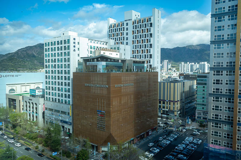 Korea-Seoul-Changwon-Train - My room has a view... shot through glass, although the window does open. Lots of very modern looking buildings. Now to work out what I am supposed to 