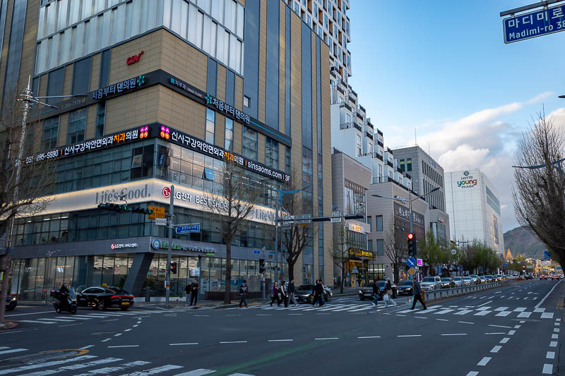 Korea-Changwon-Sangnam-Tofu - This is one of the main central streets, with department stores, wide streets with wide footpaths. Very clean and sterile.