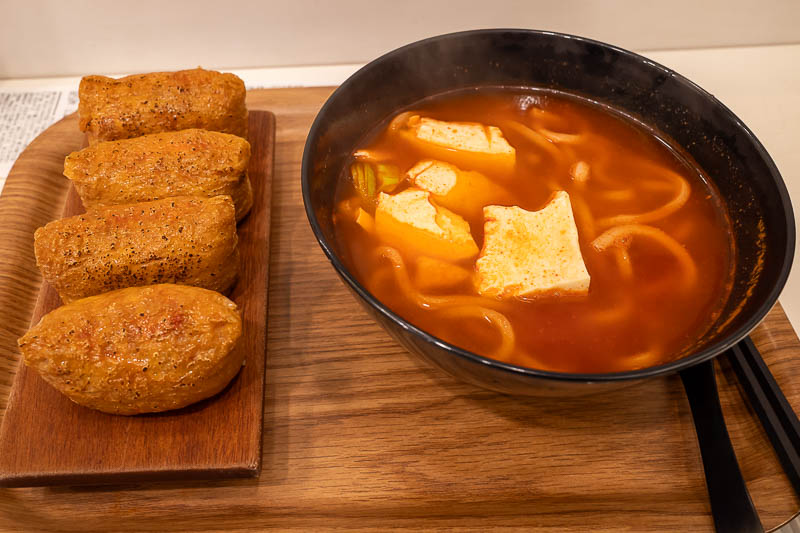 Korea-Changwon-Sangnam-Tofu - For my dinner, a very filling tofu and udon stew, with fried tofu inari, but with a Korean twist of being filled with Kimchi (of course) and bean spro