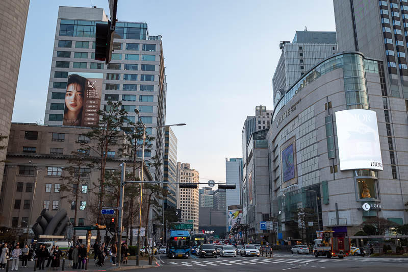 Korea-Seoul-Myeongdong-Cheonggyecheon - Behold, the main department store street, Lotte flagship on the right.