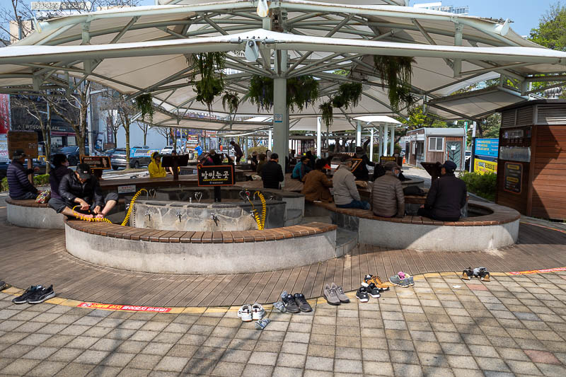 Korea-Daejeon-Yuseong-Market - They have provided a selection of shoes to choose from when you have finished washing your feet.