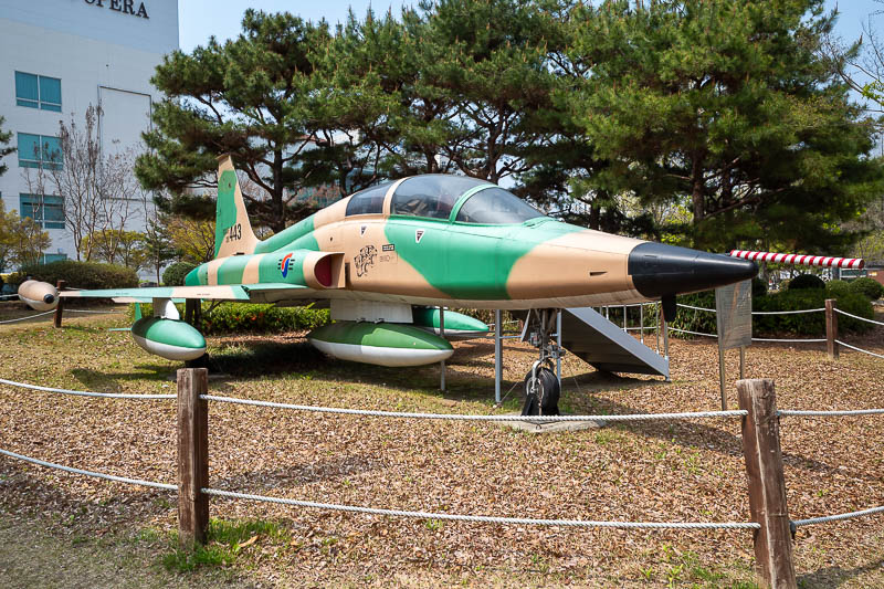 Korea-Daejeon-Yuseong-Market - Surprise fighter jets! Right out in the open in the middle of town. First up, the F-5 freedom fighter, variations of which served as the Russian jets 