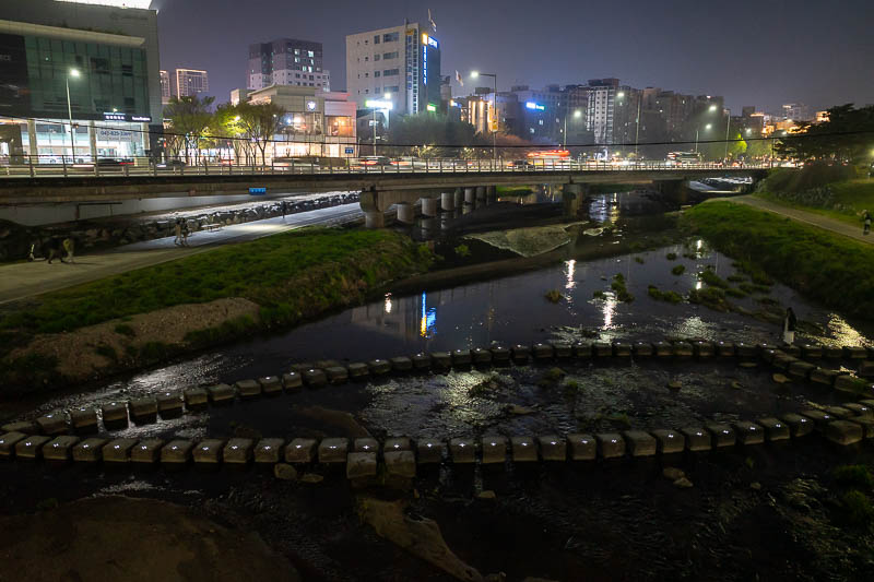 Korea-Daejeon-Gungdong-Ramen - I then decided to try my hand at a dark shot of a drain. 1/10th of a second handheld.