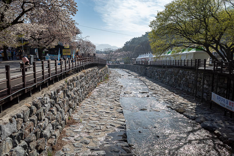 Korea-Daejeon-Hiking-Gyeryongsan - Wherever you go in Korea, there is a nice drain to appreciate. You can see a bunch of tents for street food running down the right side.