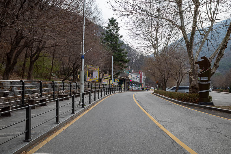 Korea-Seoul-Hiking-Soyosan - This road, which I will come back down later, heads up to a cave and waterfall area. I instead started on an unmarked trail off to the left of this sp