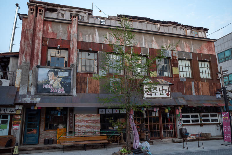 Korea-Jeonju-Hanok - Lots of interesting buildings, this is new, but made to look old. Hipster antiques inside, old bikes, smoking pipes, leather banana holders.