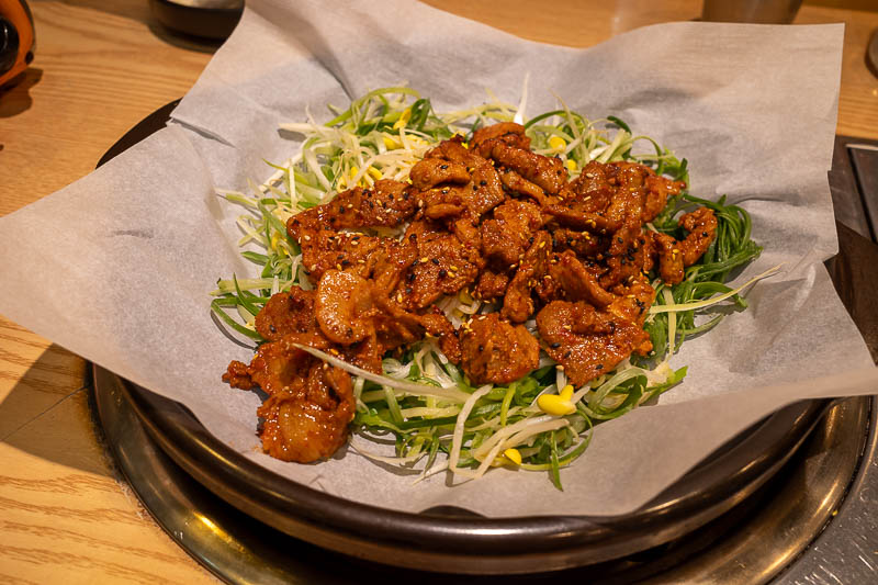 Korea-Jeonju-Hanok-Bulgogi - The actual pork bulgoi was pre cooked elsewhere and brought to my hot plate to continue cooking, I ate some of it wrapped in lettuce, but mainly just 