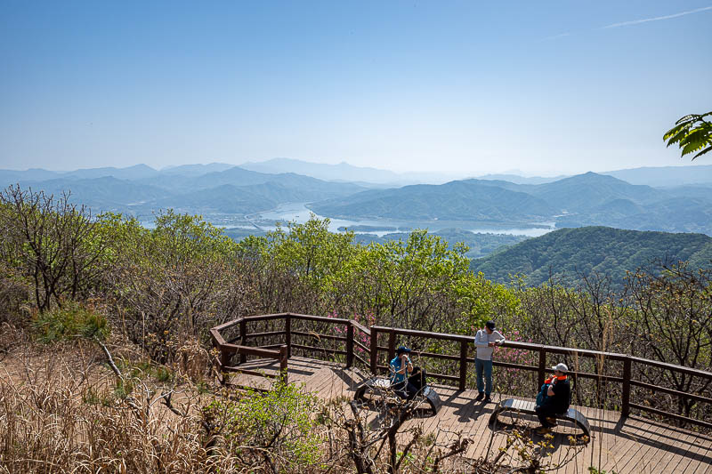 Korea-Seoul-Hiking-Geomdansan - Not quite the summit, but other people and summit furniture at the faux summit.