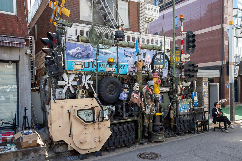 Korea-Seoul-Museum-Market - I do not know exactly what is going on here, there are air force flight suits, machine guns, traffic lights, the door off a humvee. Everything you nee