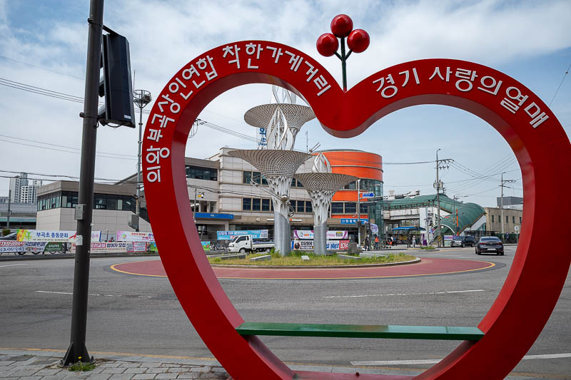 Korea-Seoul-Museum-Market - Train ride was next, a long way south, I got off at Uiwang station. Behind me is a nice enough main street.