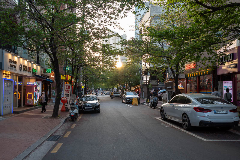 Korea-Seoul-Hongdae - Before you get to the red road itself, there are many streets full of shops, nice trees, sunsets.