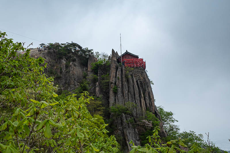 Korea-Seoul-Hiking-Gwanaksan - Best I can do for a photo of the temple on a cliff, I think it is behind a gate.