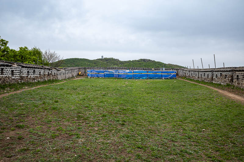 Korea-Seoul-Namhansanseong-Fortress - The first bastion. A lot of the bastions have construction going on. Eventually I get to say 'the last bastion of hope'.