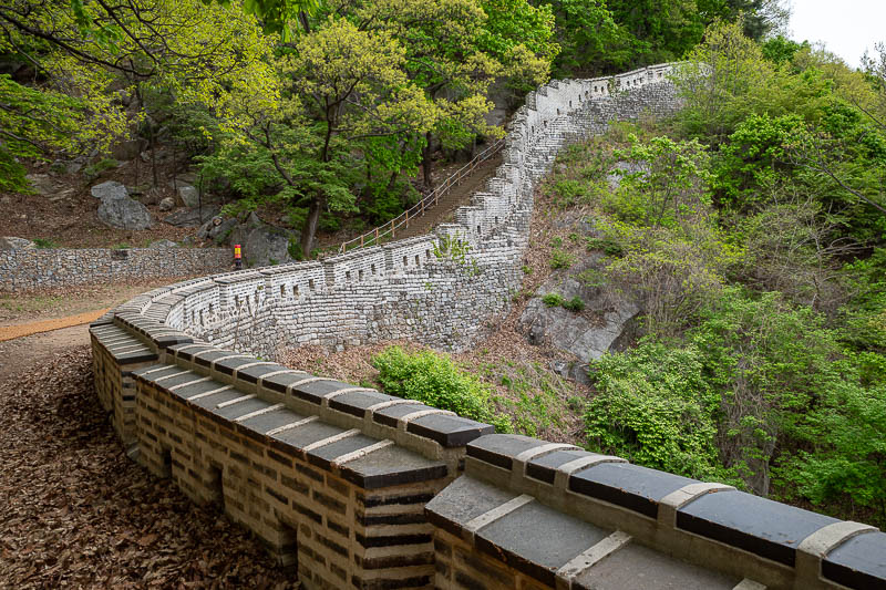 Korea-Seoul-Namhansanseong-Fortress - Parts of it have the hessian mat to walk along. New hessian mat too.