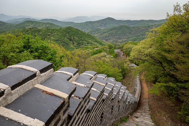 Korea-Seoul-Namhansanseong-Fortress - The Stepped wall helps explain how steep parts of it are. Normally photos fail to convey steepness.