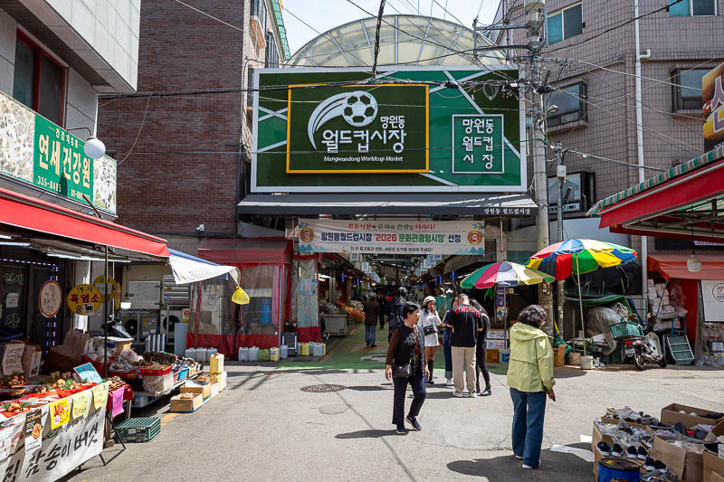 Korea-Seoul-Inwangsan-Market - The other end is labelled Mangwondondong world cup market, with a few soccer (football) balls painted around the place.