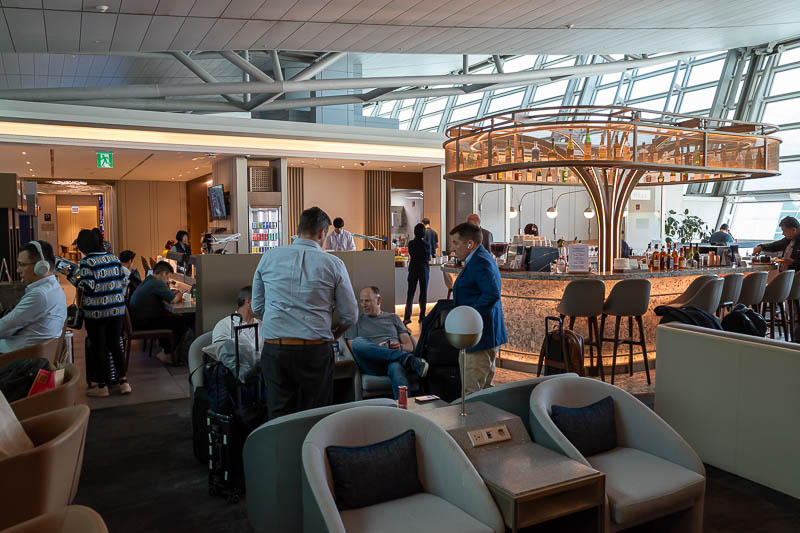 Korea-Singapore-Airport - This is the busy lounge at Seoul. A lot of white guys doing business. One group in particular was amusing to me, because the boss guy called up his so