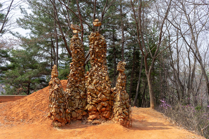 Korea-Daejeon-Hiking-Gyejoksan - Another pile of rocks, also a pile of red clay. The clay is not naturally here, the government has trucked in about a quadrillion Korean tonnes of HWA