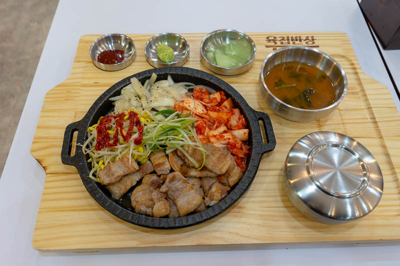 Korea-Daejeon-Shopping - My dinner, its pork I think. At some point a non Korean has obviously come to this place and gone insane because they were served pork. Either that or