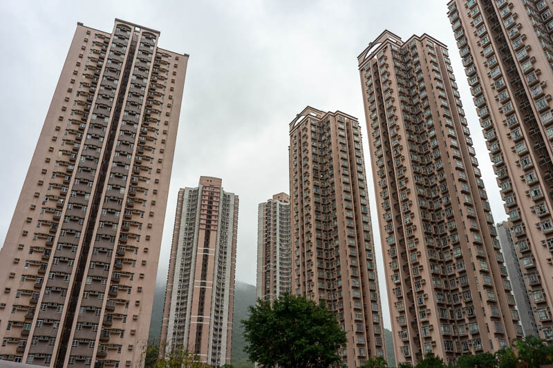 Hong Kong-Hiking-Ma On Shan - Here are just a few of the thousands of apartments in this recently constructed suburb. You can see the mountains behind it, in the fog. I was in deni