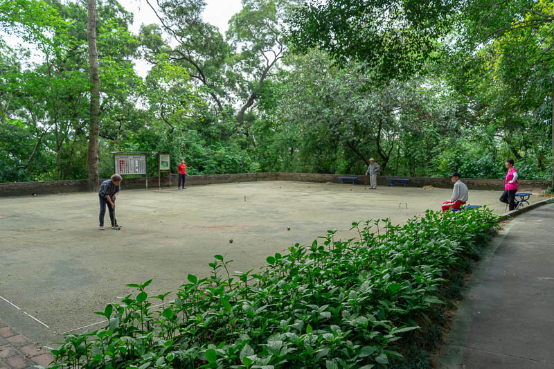 China-Guangzhou-Hiking-Baiyun - This extensive park had everything, lots of people running backwards, slapping themselves, and croquet. There was a cheating scandal unfolding on the 