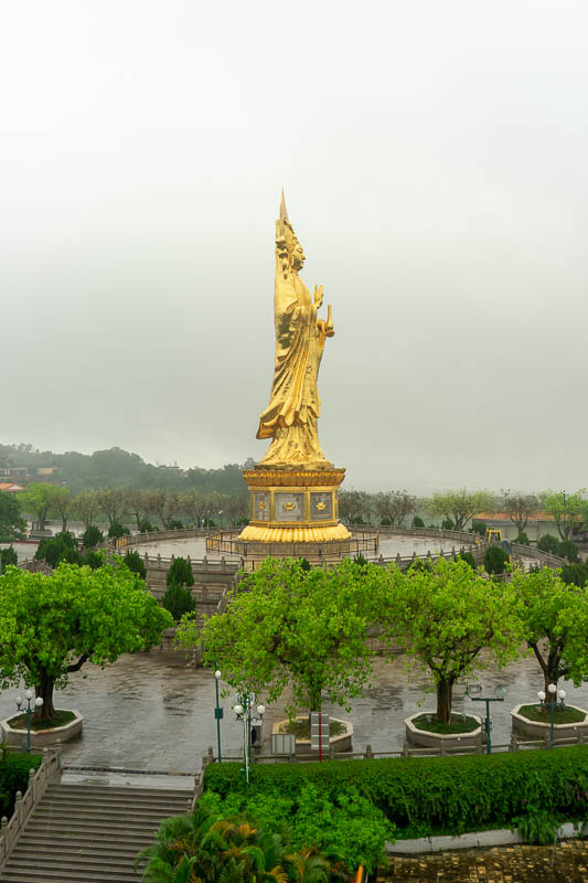 China-Guangzhou-Rain-Lotus Hill - This was the closest I could get to giant gold statue, as seen from the corner of the giant temple on one of my many laps around its upper levels. Tho