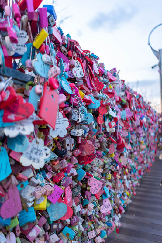 Korea - HK - China - KORKONG! - The love locks are still at the top of the tower hill. I think they all get removed and thrown out once a week. Theres millions of them.