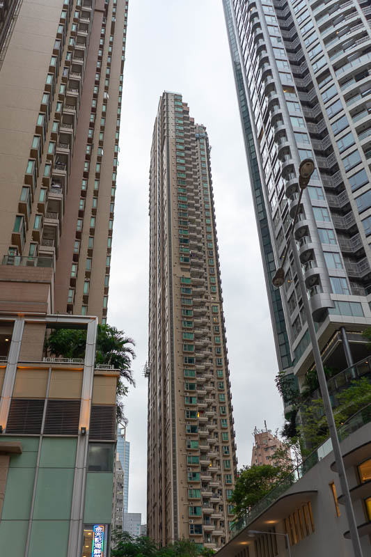 Hong Kong-Causeway Bay-Food - I am impressed with how tall and skinny buildings can be, until they fall over. Did that ever happen?