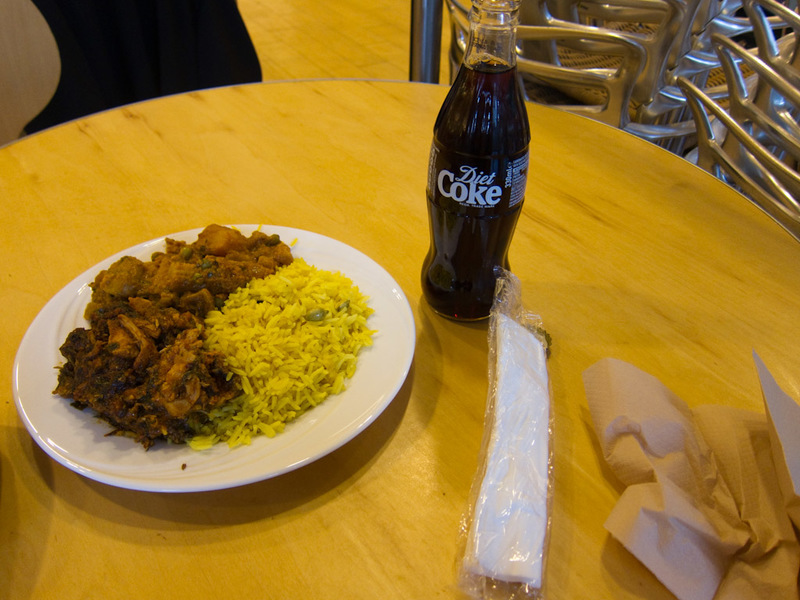 England-London-Canary Wharf - Heres my dinner, I ate in a Waitrose supermarket. They set up a few tables and have hot meals to go. This cost 4 pounds, chicken balti, vegetable curr