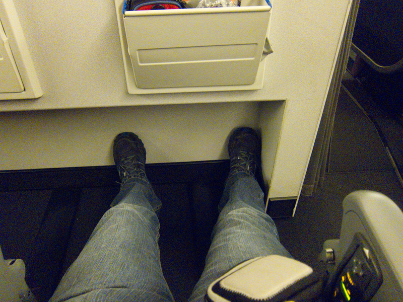 London 3 - June/July 2010 - My feet cant touch the bulkhead in front of me, especially once the seat was reclined, noisy pictures because it really was dark here. I didnt take an