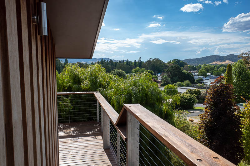 - View from the pod balcony. The accommodation is called a pod. A wooden detatched 2 level apartment joined by a deck to a larger accommodation house bu