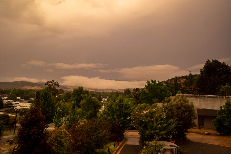  - Storm at dusk, low cloud in the mountain valleys.