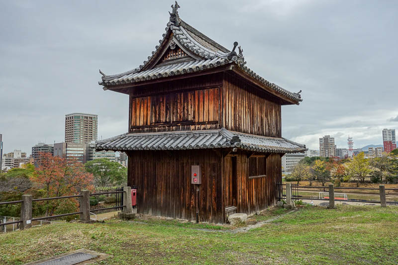 news - Fukuoka has no castle. It has castle ruins. No one goes to look at them. I did. It made for this nice desaturated photo of a wooden gardening shed.