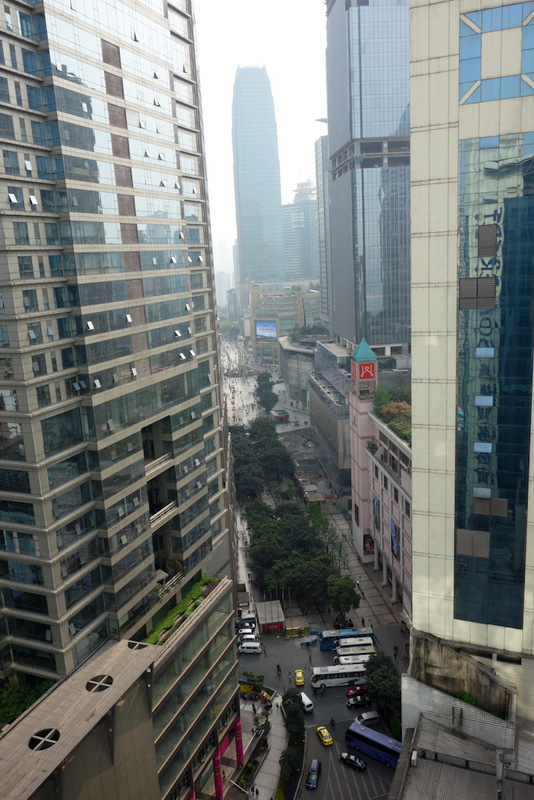 China-Chengdu-Chongqing-Bullet Train - My hotel is very impressive, I will talk more about it later, its an executive apartment and cheap, but has the greatest view ever. The street below w