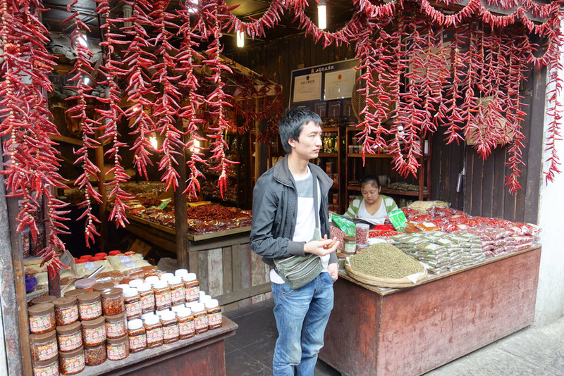 China-Chongqing-Ciqikou-Temple - These shops (and theres a lot of them the same) sell nothing but chilli, sichuan pepper or blends of both in oil.
