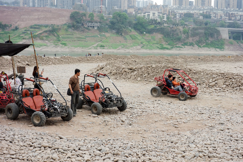 China-Chongqing-Ciqikou-Temple - Off in the distance I saw dune buggies. I thought I might have a go but once I made the trek over boulders and construction material they were about a