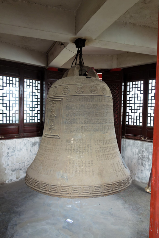 Sichuan - China - Chengdu - Chongqing - March 2013 - Another monk upsold me for a few more cents to climb the bell tower. How could I refuse. Heres a bell.
