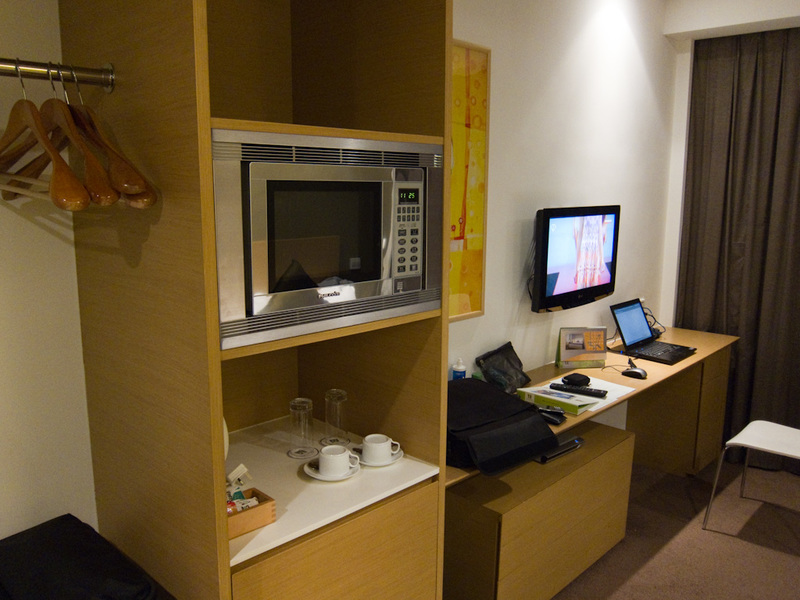 Taiwan / Hong Kong / Singapore - March/April 2011 - My work station. Where I am sitting typing this. Something great and unusual, a microwave. Not sure if I will use it but if I see any crazy foods that