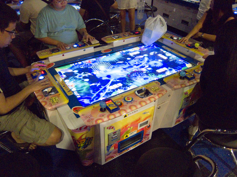 Taiwan / Hong Kong / Singapore - March/April 2011 - I found a huge games arcade, they had many more actual games rather those silly gambling style games. Thes coolest type were these group top down game