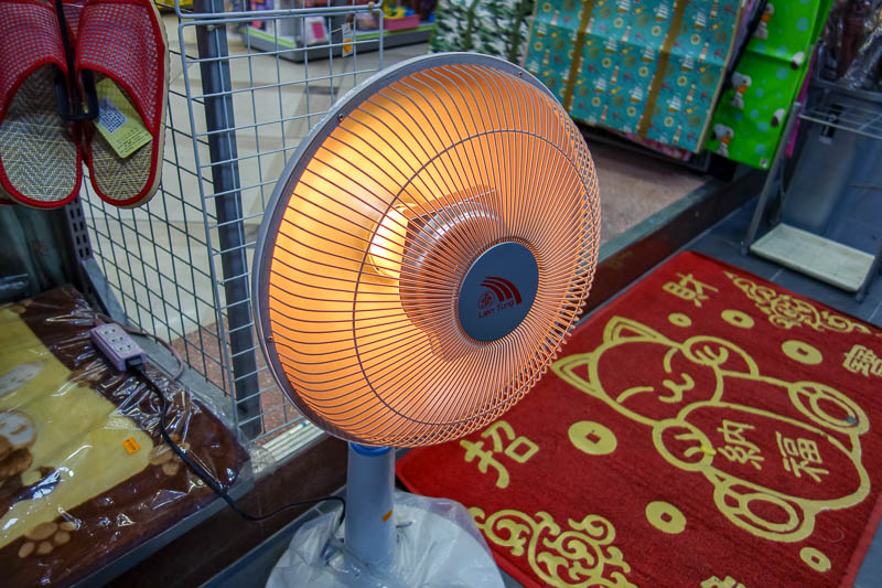 A full lap of Taiwan in March 2017 - Taiwanese heater. Stick a heating element in a $5 fan. What could possibly go wrong? Also its about 20C, yet people have winter coats and are sitting 
