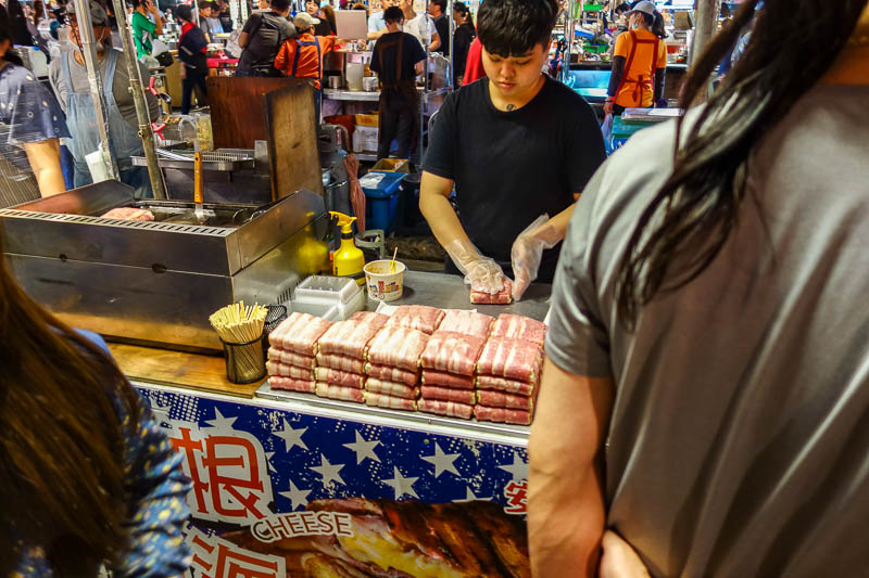 Taiwan-Tainan-Night Market-Flower Market - Or you can have some fried bacon wrapped cheese. Good for the healthy.