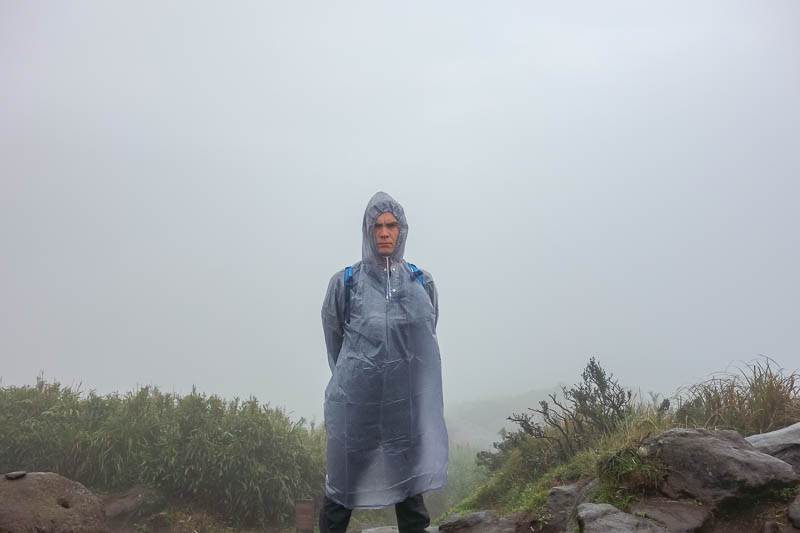 Taiwan-Taipei-Hiking-Yangmingshan - Challenge accepted. Pose in the rain with my coat on. My camera got wet, all photos have water marks on them now. Actual marks made by water.
