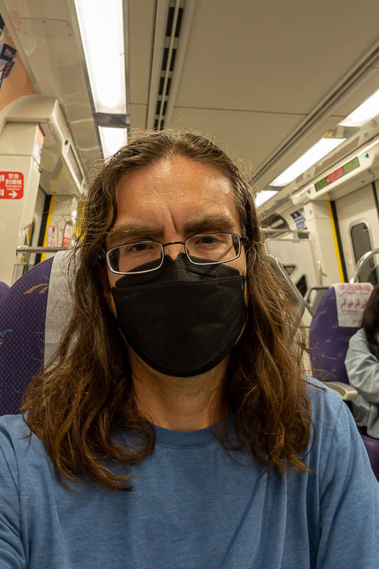 Taiwan for the 5th time - April and May 2023 - This is me looking thrilled to be on the train, after 36 hours of no sleep. I look a bit like the new downs syndrome barbie doll that was in the news 